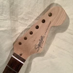 Genuine Fender Squier Maple Neck Rosewood Fingerboard Stratocaster Guitar. Fixed Price $100.00.