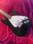First Act Me 1957 Black Electric Guitar With Box And Book. Fixed Price $85.00.
