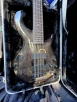 Dean Rhapsody 12-STRING Bass Guitar Transparent Black Gloss Wood. Fixed Price $749.00.