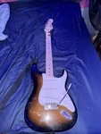 Squier Stratocaster 2007 Sunburst Electric Guitar Maple Neck Rh 6-STRING Strap. Fixed Price $125.00.