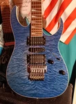 Ibanez RG4EX1 Electric Guitar With Quilted Maple Top. Fixed Price $323.00.