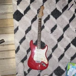 Squier By Fender Stratocaster Electric Guitar Red 6 String Rosewood Right-handed. Fixed Price $180.00.